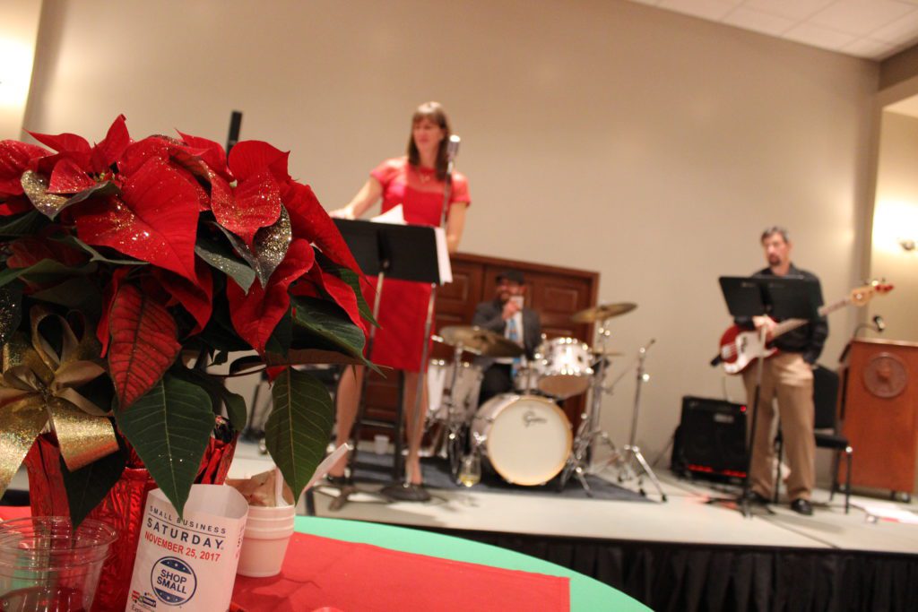 2017 Hutchinson Ambassadors Taste of the Holidays photos with flowers and musicians