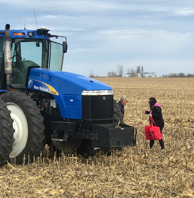 2018 Farm Fatigue Bucket of Thanks delivery tractor in field