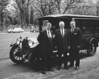 Richard, Everett and Robert Hantge pictured with a hearse from the early 1900’s still owned by the Quast Family. This picture was taken at Esther Quast’s funeral on May 24, 2002.