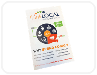 A photo of a ThinkLOCAL Poster with facts and graphs.